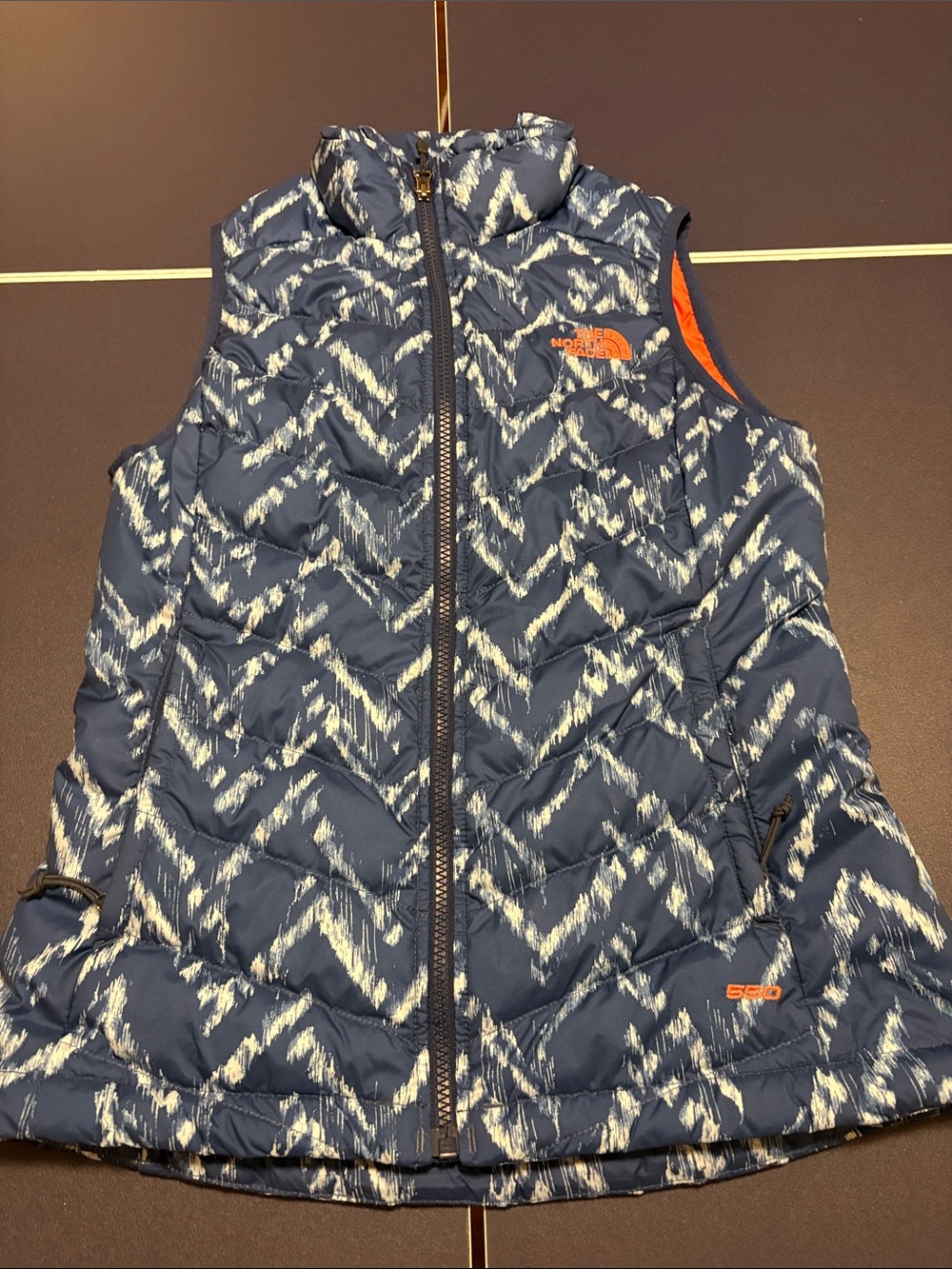 The North Face Navy Quilted Vest with White Pattern & Orange Logo Womens XS